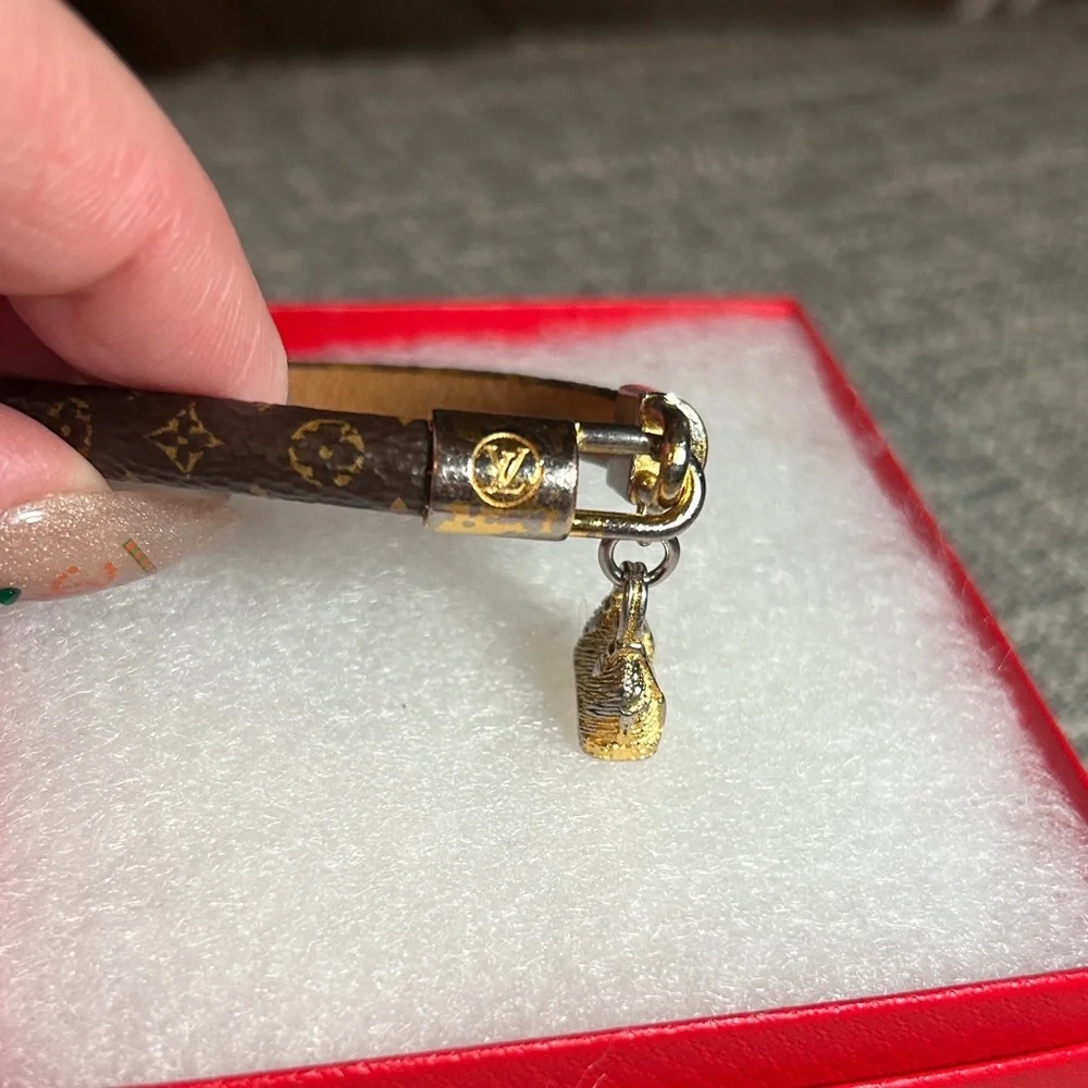 267. Louis Vuitton Monogram Alma Charm Bracelet with COA